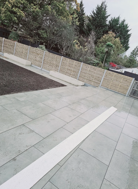Completed garden paving with fencing London